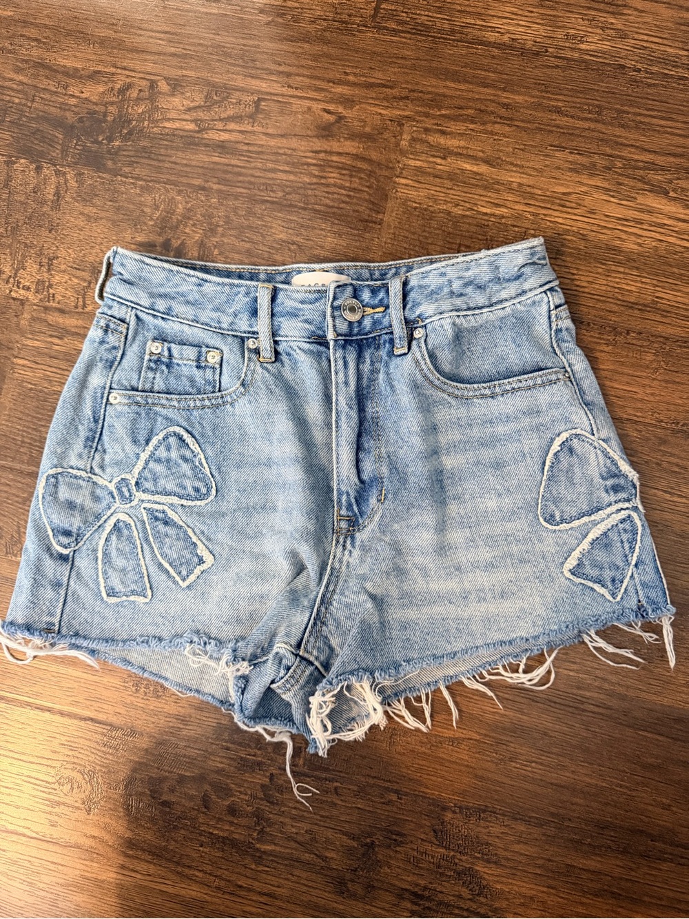 PacSun Light Blue Distressed Denim Shorts with Bow Appliqués